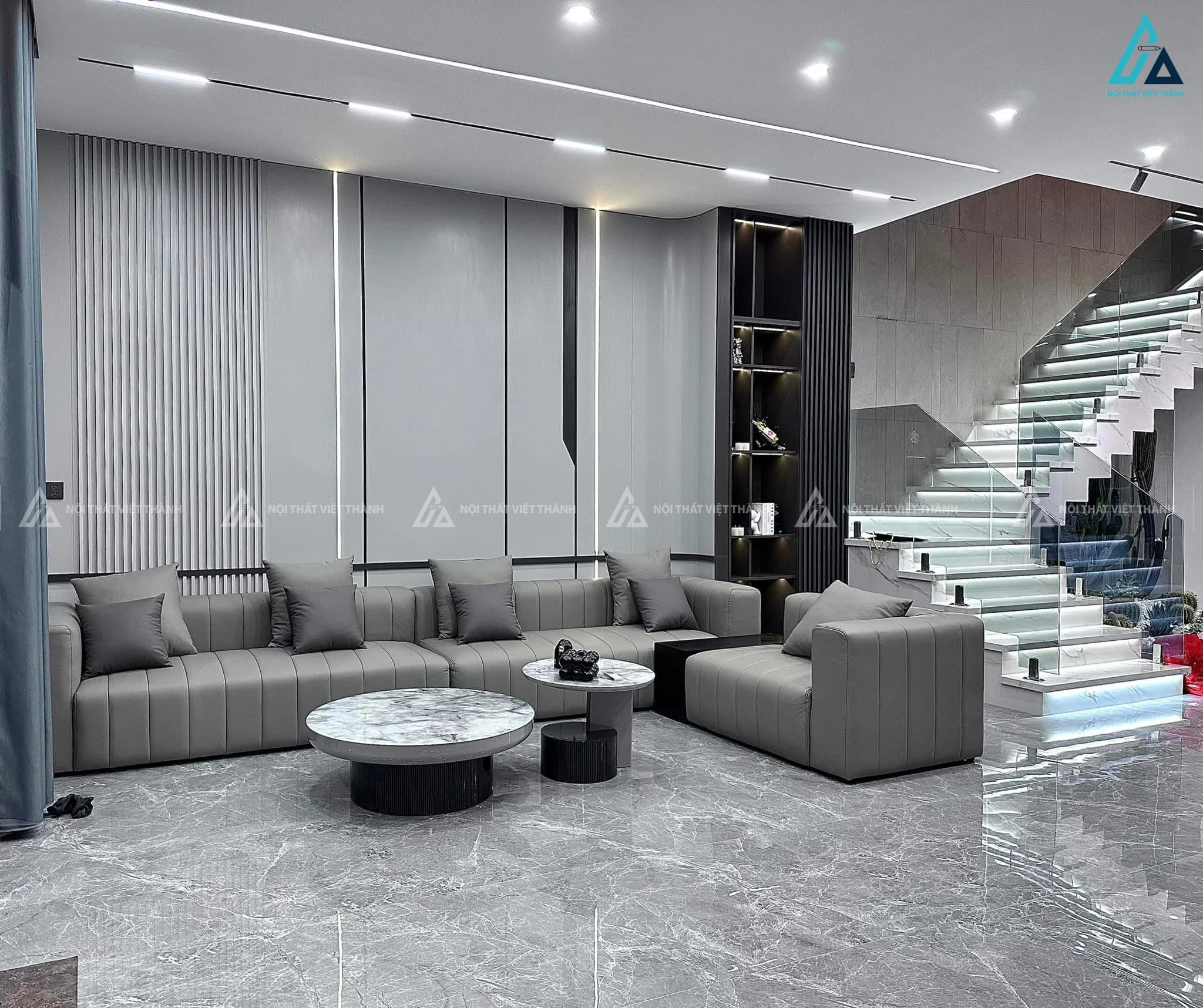 Mẫu sofa da xám dài cho không gian phòng khách rộng
