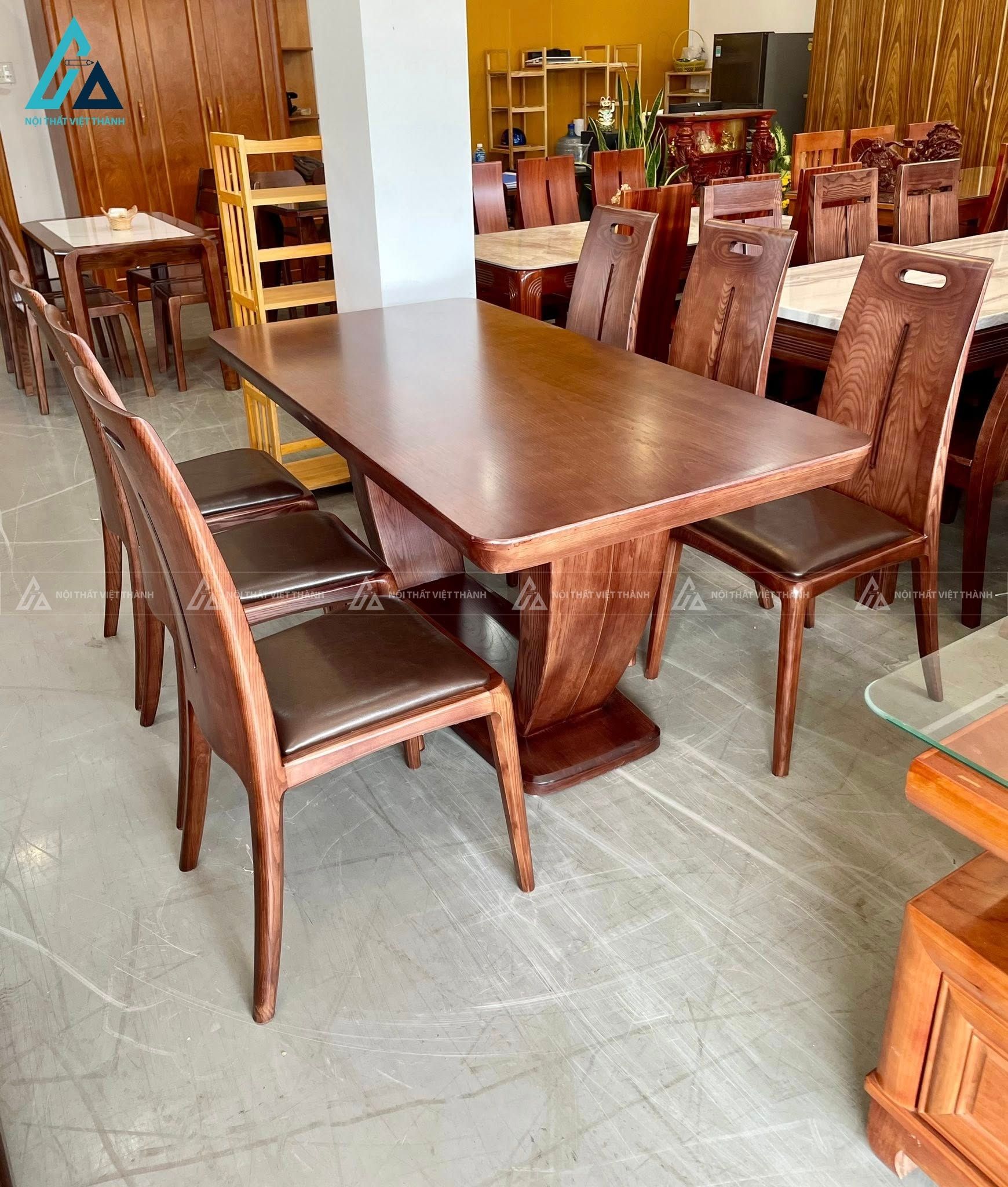 Mẫu thiết kế bộ bàn ăn gỗ nâu chữ nhật và ghế đệm da
