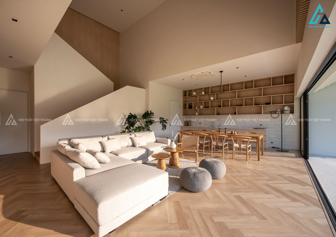 Mẫu thiết kế nội thất biệt thự phòng khách nổi bật với bộ sofa cao cấp.