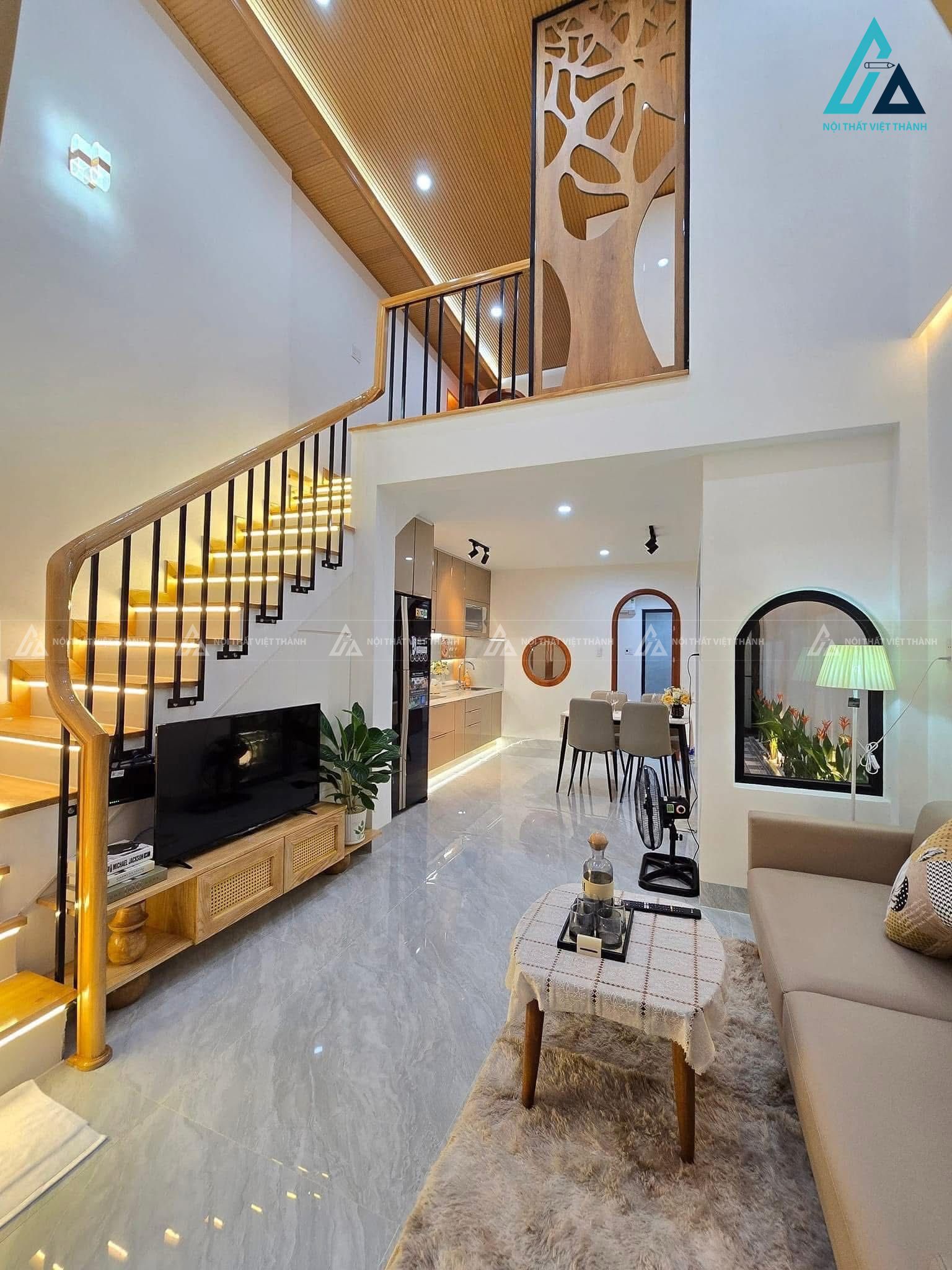 Mẫu thiết kế nội thất phòng khách hiện đại liền kề bếp