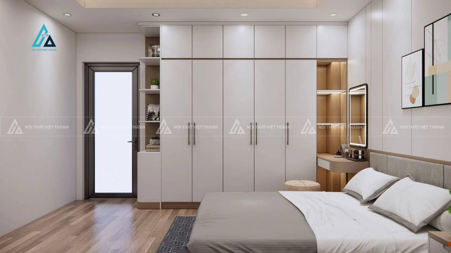Mẫu thiết kế tủ quần áo trắng kết hợp kệ trang điểm