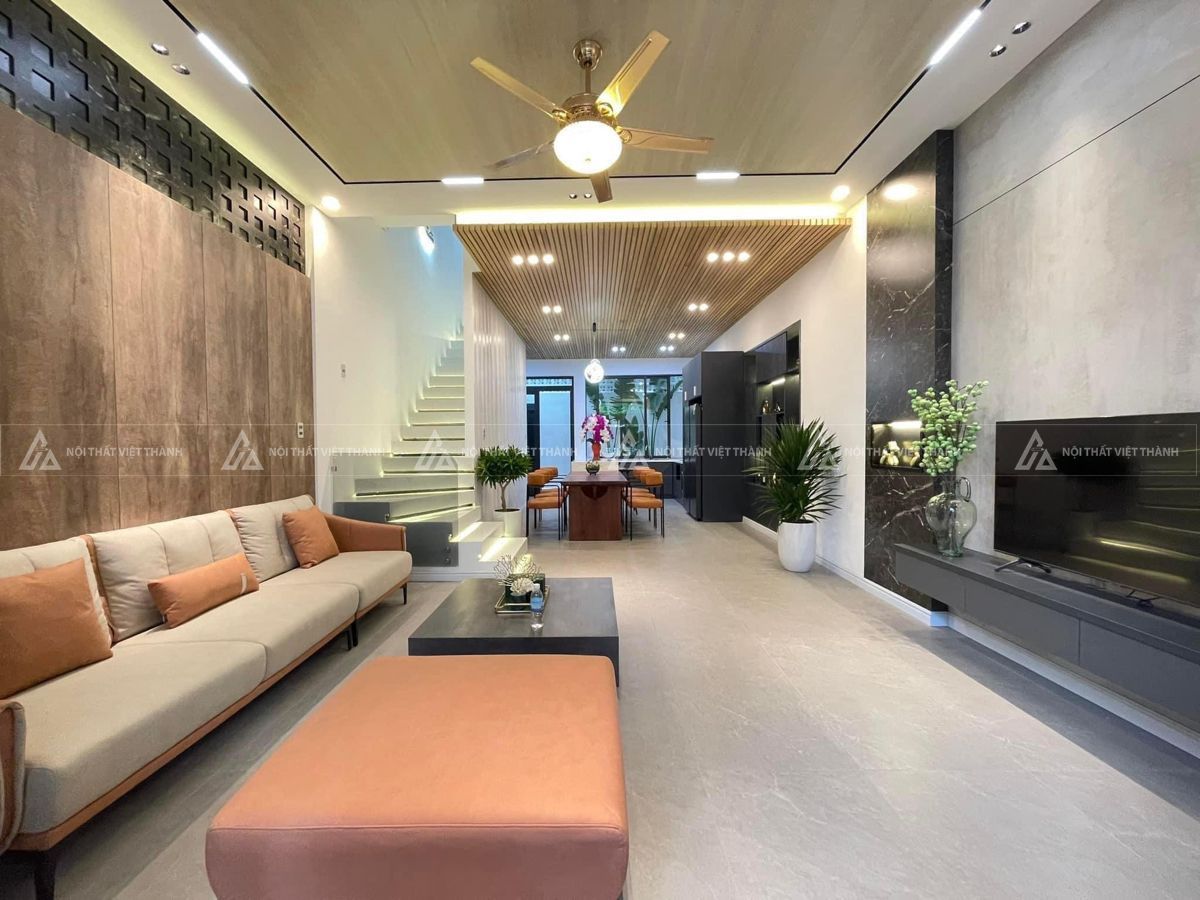 Bố trí sofa phòng khách nhà ống sát tường