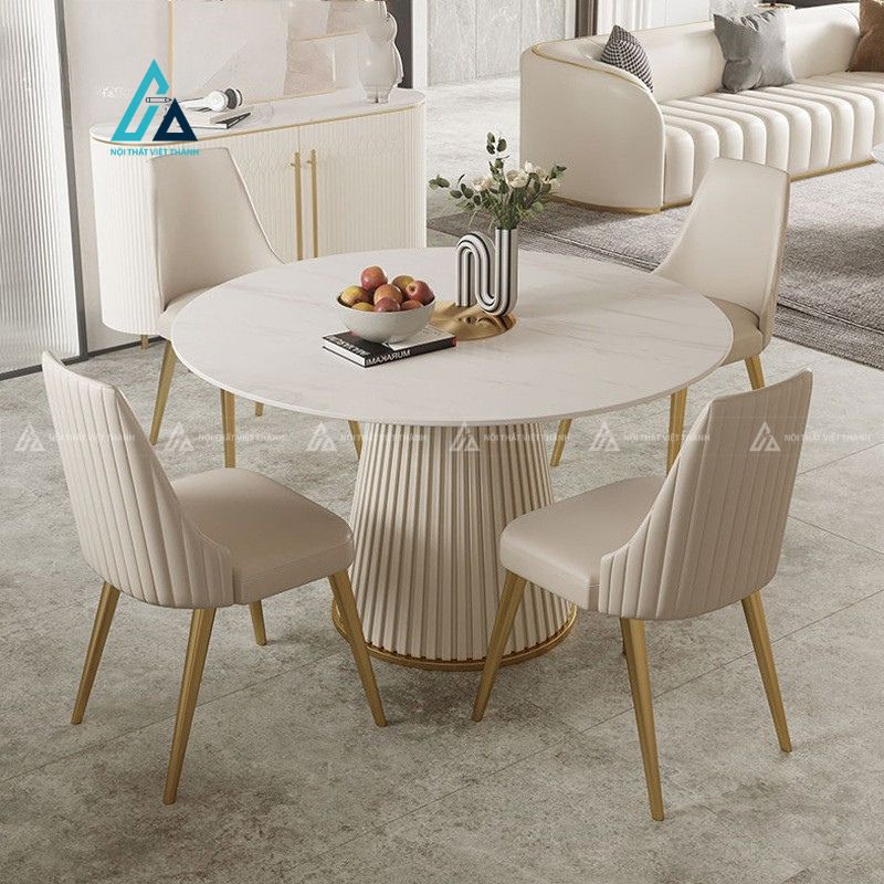 Bộ bàn ăn mặt đá tròn chân trụ gấp nếp tinh tế hiện đại 1