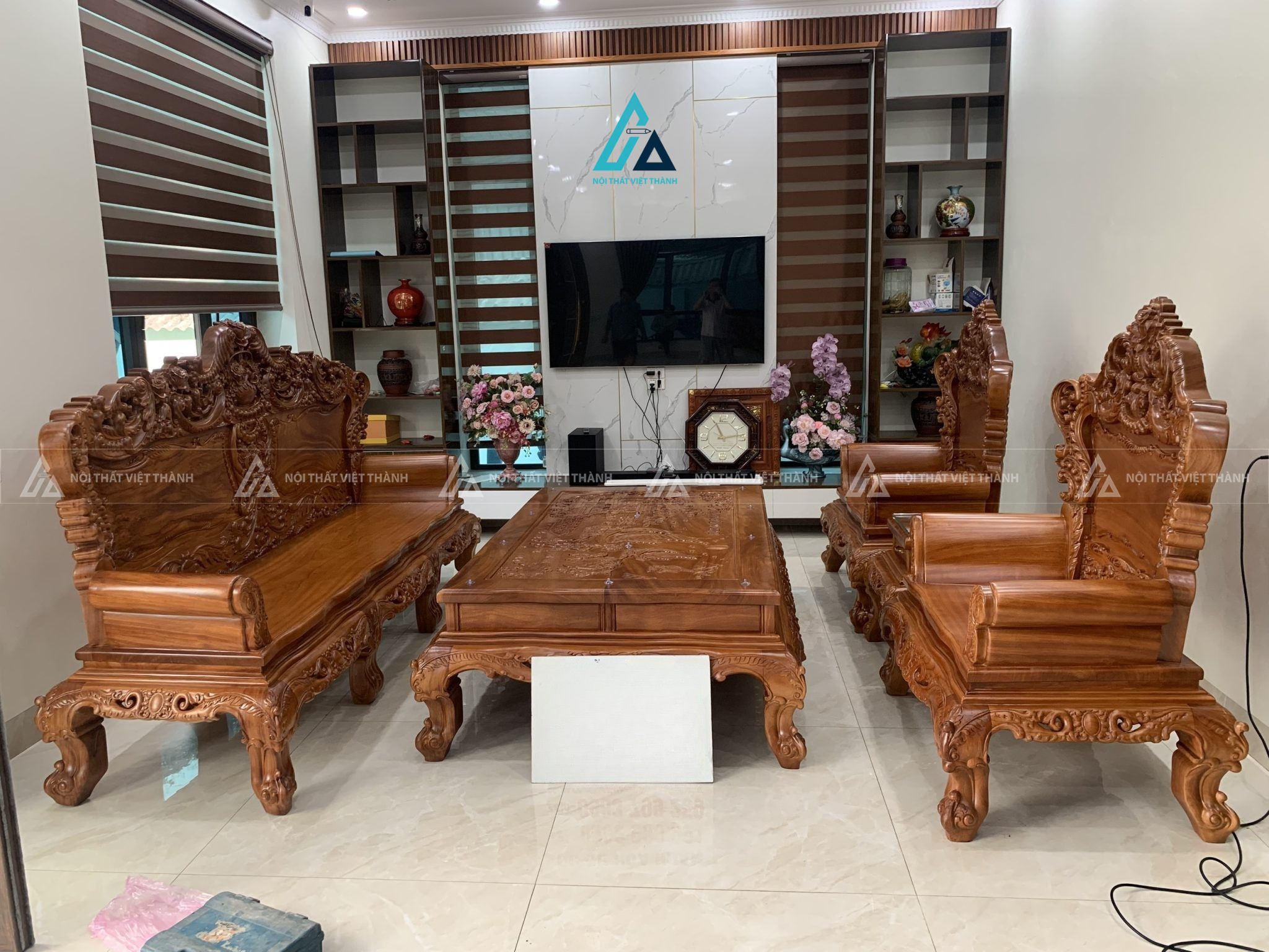 Bộ bàn ghế salon gỗ chạm khắc nghệ thuật cho không gian phòng khách