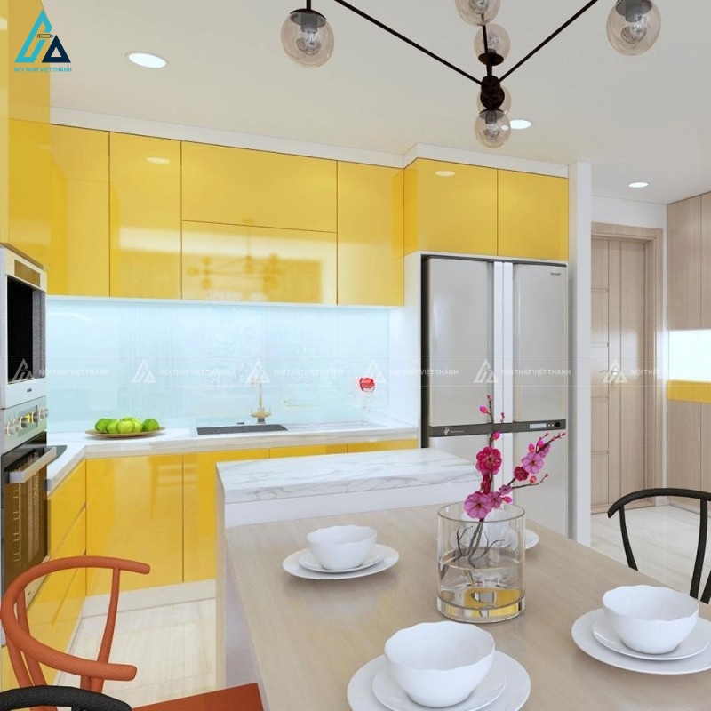 Thiết kế tủ bếp acrylic vàng rực rỡ phối mặt đá trắng ấn tượng 1