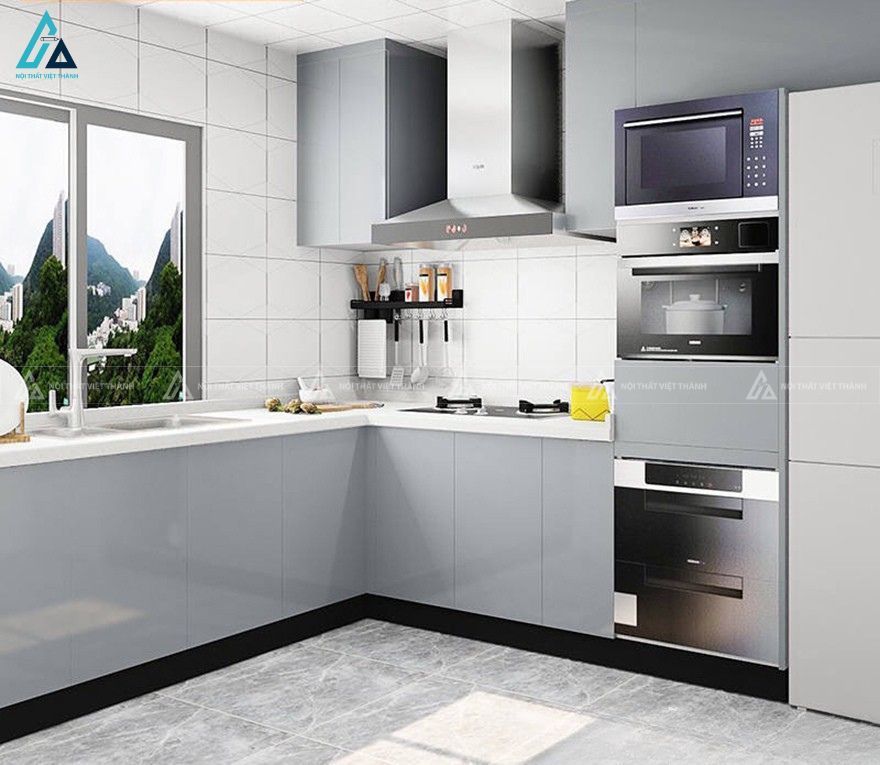 Tủ bếp mdf chữ L hiện đại với hệ tủ thiết bị tích hợp thông minh