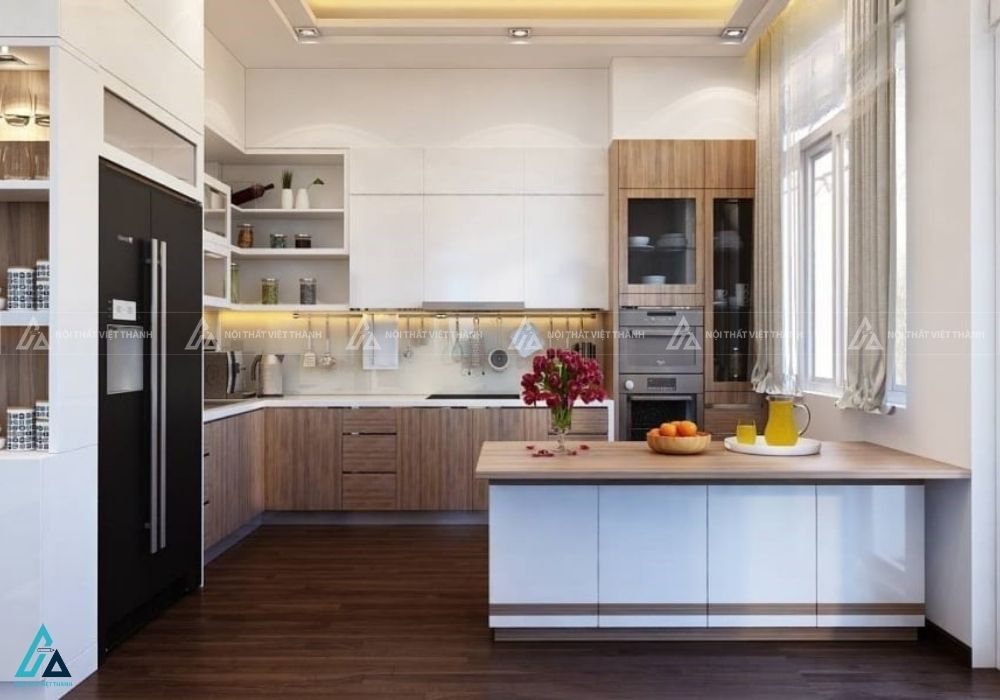 Mẫu tủ bếp gỗ mdf chữ L tích hợp đảo bếp đa năng tiện nghi
