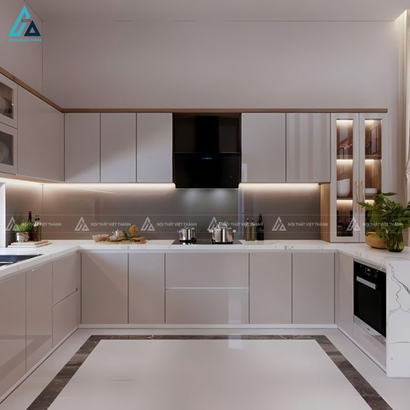 Tủ bếp acrylic màu kem kết hợp bàn đảo đá vân mây sang trọng 1