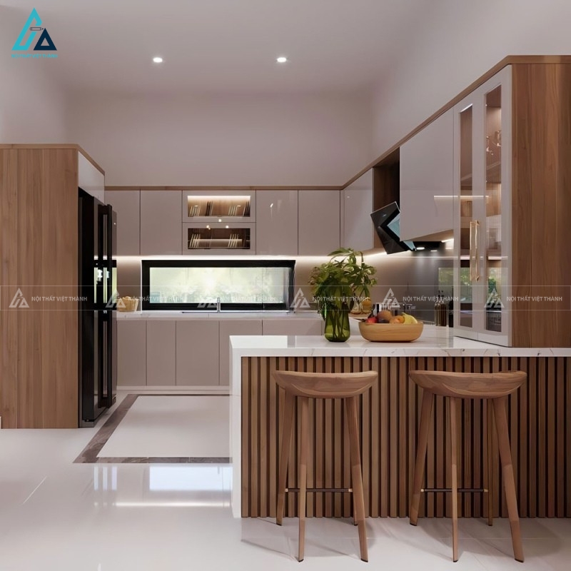 Tủ bếp acrylic màu kem kết hợp bàn đảo đá vân mây sang trọng 3